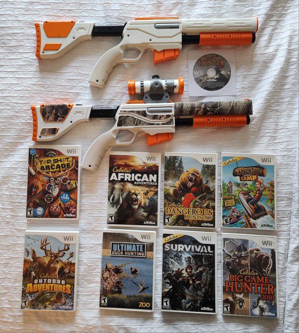 Nintendo Wii With 2 Guns And 9 Shooting Games 