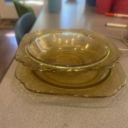 Amber depression, glass bowl, and small plates