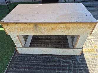 Homemade work table with wheels,  very solid and sturdy