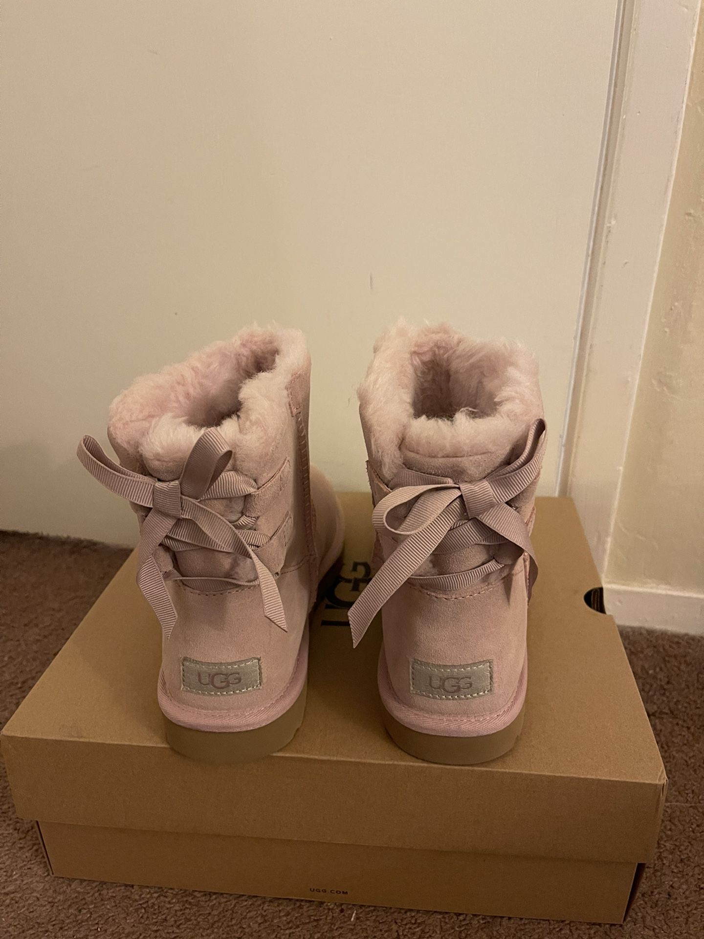 100% Authentic Brand New in Box UGG Mini Continuity Bow Boots / Women size 5, 6, 8 / Color: Pink Crystal 