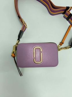 Brand new purple crossbody bag.