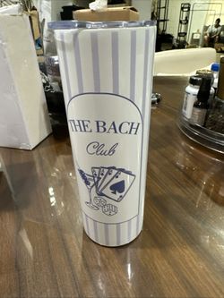 The item selected is a custom "The Bach Club" 20oz stainless steel bachelorette tumbler, featuring purple-and-white stripes and a poker-themed graphic