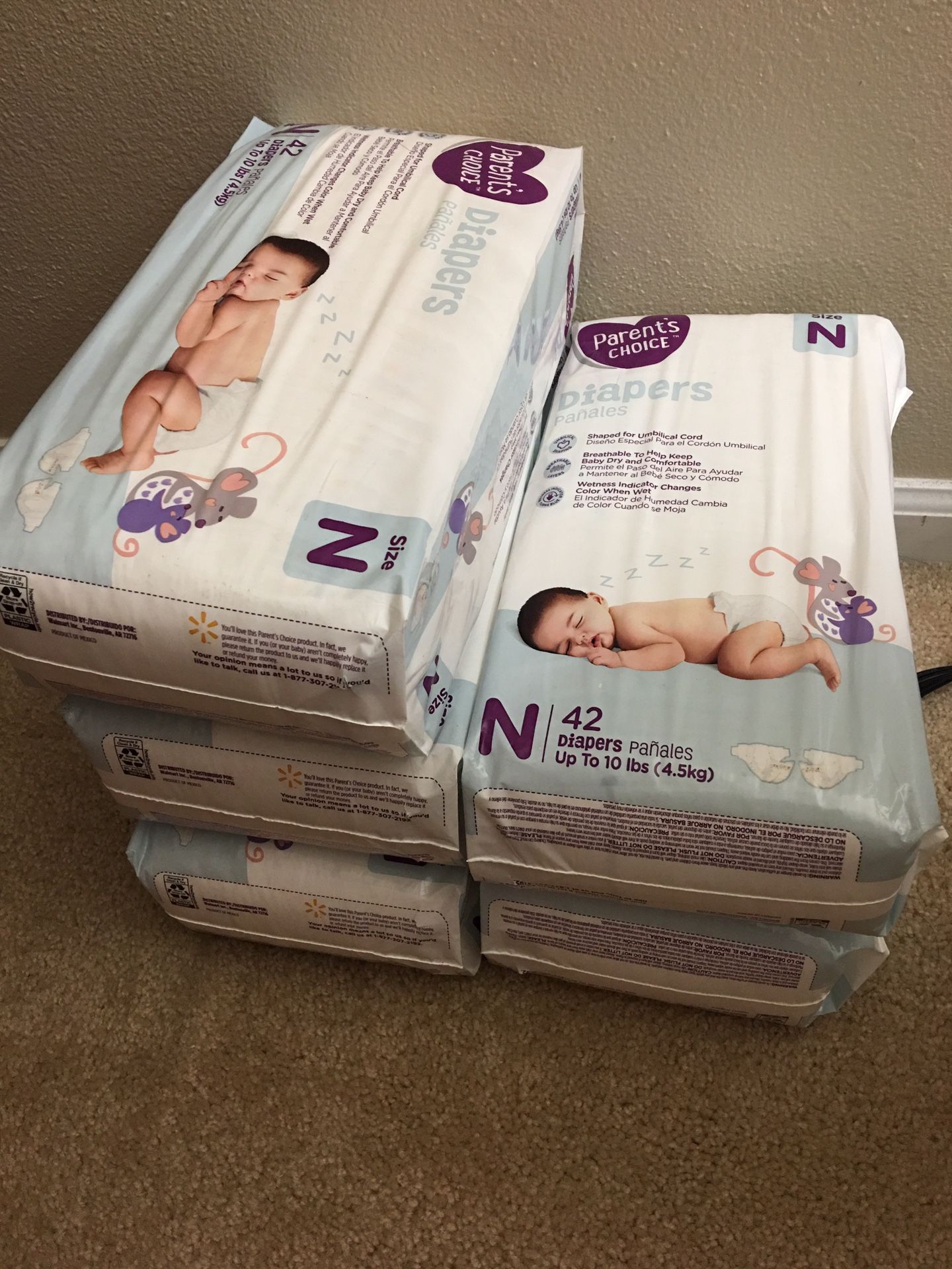 NEW UNOPENED- Newborn diapers 5 bags -210 diapers