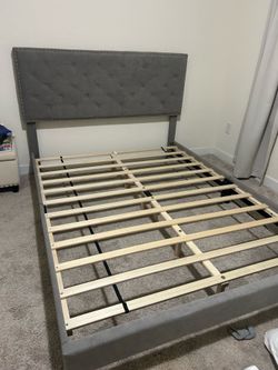 Grey tufted queen platform bed
