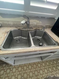 Used stainless steel double sink & faucet