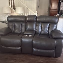 Grey leather sofa and loveseat