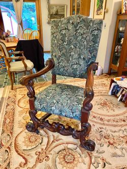 Antique Throne Chair with ornate woodworking 