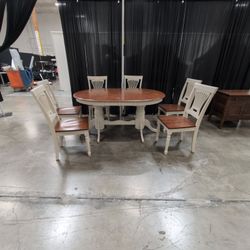 Two-Tone Extendable Dining Table with Pedestal Base