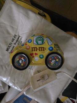 vintage M&M's Candy Collectible Storage Tin shaped like a Volkswagen VW Bug Beetle Car