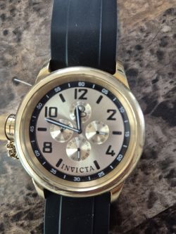 Golden black and Invicta men'swatch