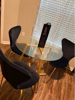 Glass table with 3 chairs