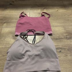 2 Large Sport Bra Puma and Pink  $20 Both 