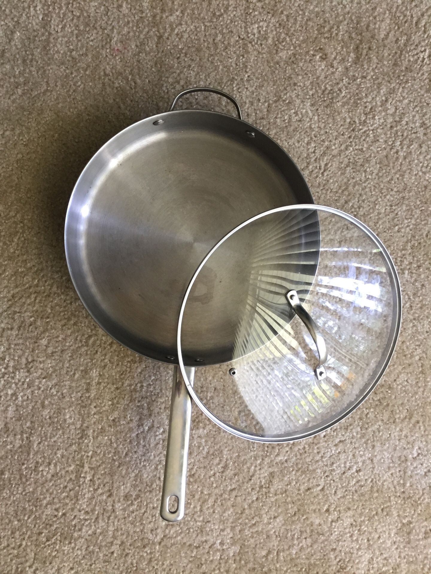 Stainless steel cooking pan.