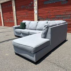 Ashley’s Gray Sectional Sofa Couch with right facing chaise