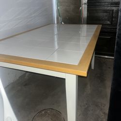 large table with 4 chairs 