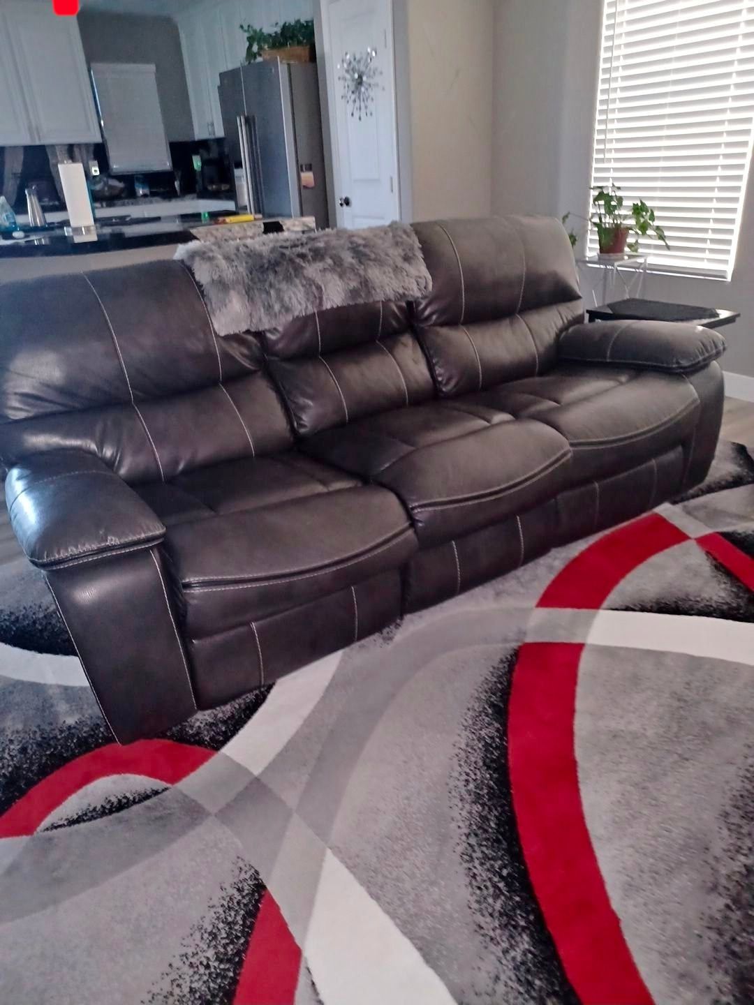 Modern dual recliner dark Grey modern leather Like couch pet free smoke free