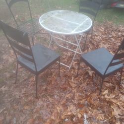 Wrought-iron Chairs And Table