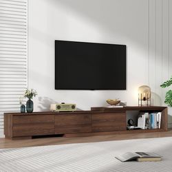 Extendable TV Stand with 3 Drawers, Modern Minimalist Entertainment Center, Reversible Long TV Media Console, Bevel Design, 82-107.3 Inch, Walnut