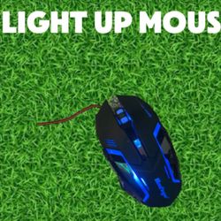 Light up gaming mouse that changes color with the click of a button