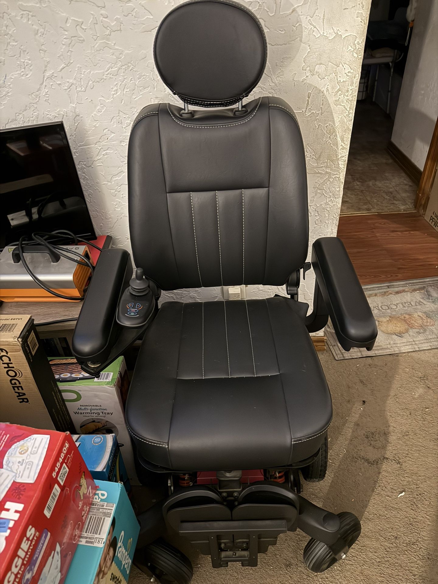 BRAND NEW MOTORIZED WHEELCHAIR FOR SALE – NEVER USED