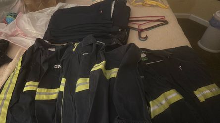 Men’s uniforms good condition 12 long sleeve shirts size XL AND 10 blue pants size 38by 30