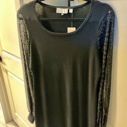 NEW. LADIES BLACK KNIT DRESS WITH SEQUINED SLEEVES, SIZE MEDIUM, KNEE LENTH. BUY TODAY $22.00