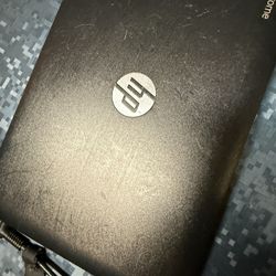 Selling this HP Chromebook with charger  Turned on as seen in the pictures
