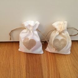 For favors: 23 Small heart burlap bags with drawstring