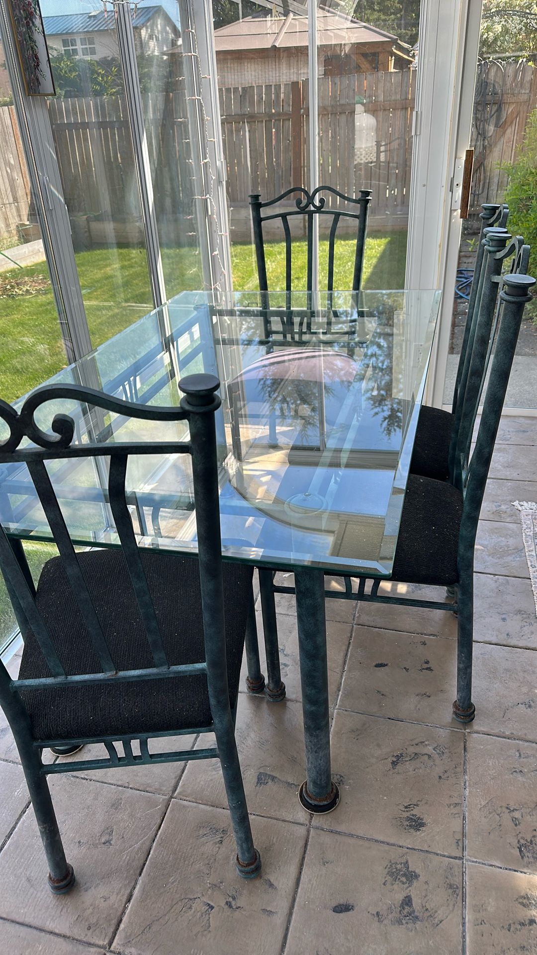 Glass table and four chairs