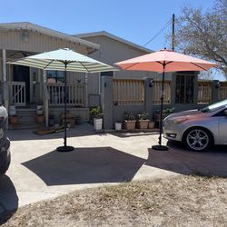 Sombrilla Con Base 9 Pies $100 sombrilla rayada vendida