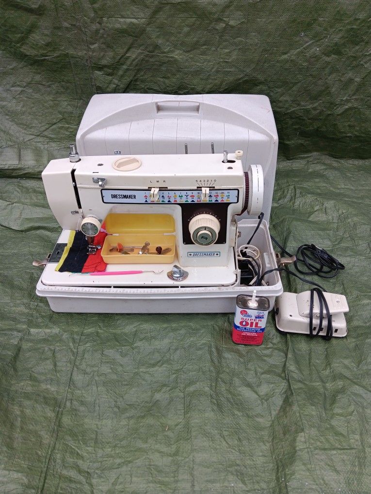 Singer 2402 Sewing Machine With Yards Of Clothing Materials
