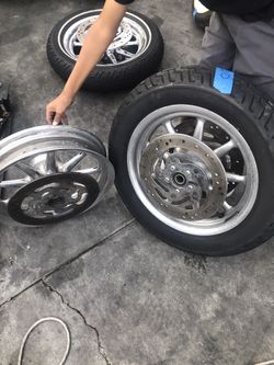 Polished wagon wheels front tire 90% thread, back rim needs bearing and tire