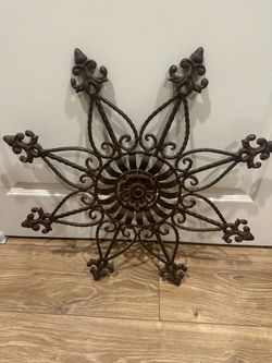 Rusted looking wrought iron wall art
