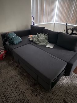Gray pull out sectional couch