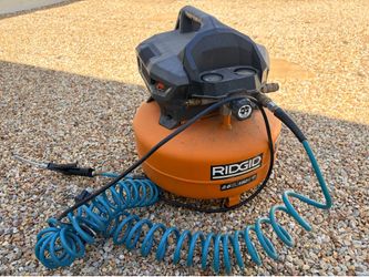 RIDGID 6 Gal. 150 PSI Portable Electric Oil-Free Jobsite Pancake Air Compressor with Dual Pressure Gauges and 2-Quick Couplers