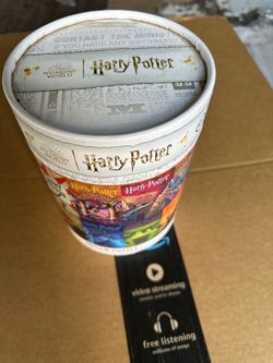 Harry Potter Book Covers 1000-Piece Jigsaw Puzzle packaged in a signature collectible cylin