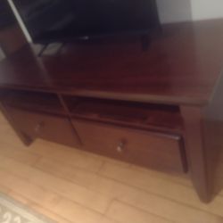 2 Really Nice TV Stands For Sale, 1 Classy Brown Finish And 1 Flat White TV Stand With Nice Basket Drawers $60 O.B.O
