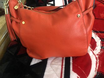 MK handbag orange leather color