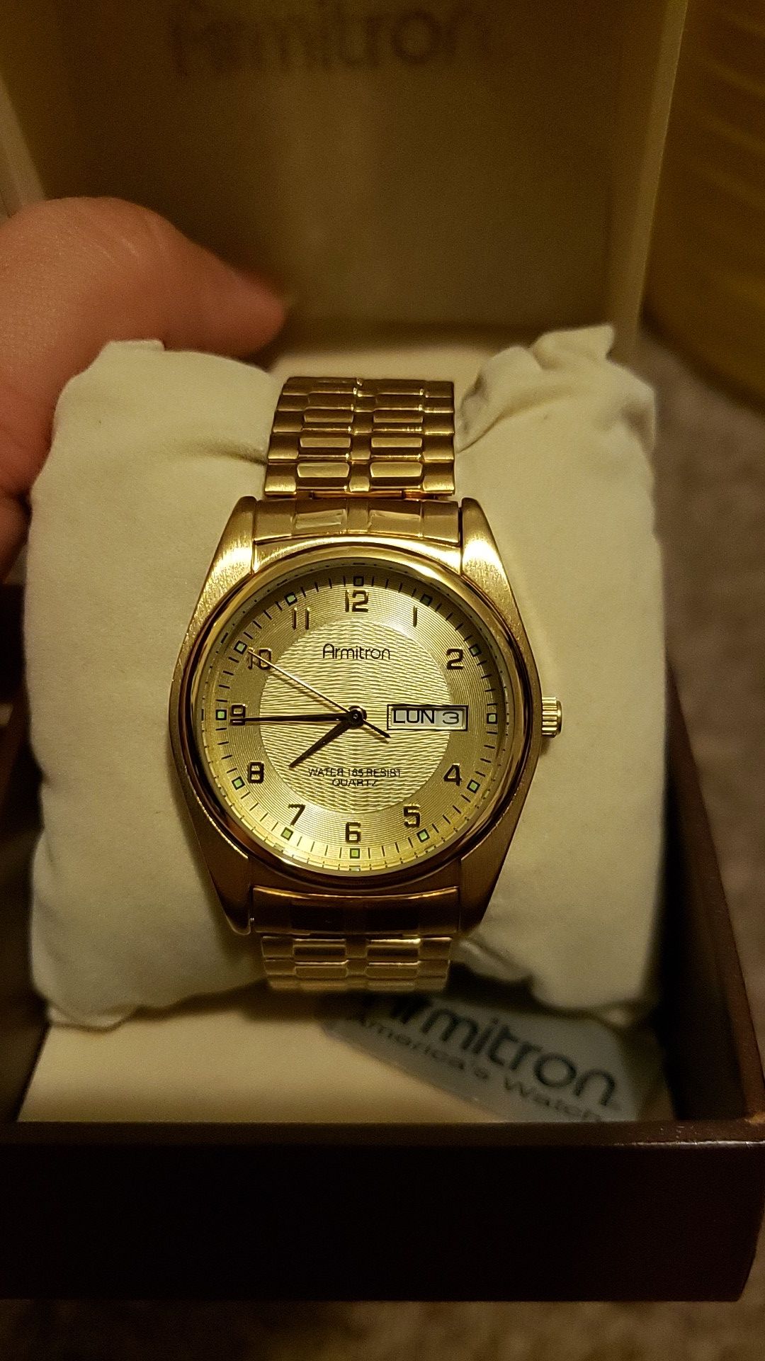 Gold Armitron watch