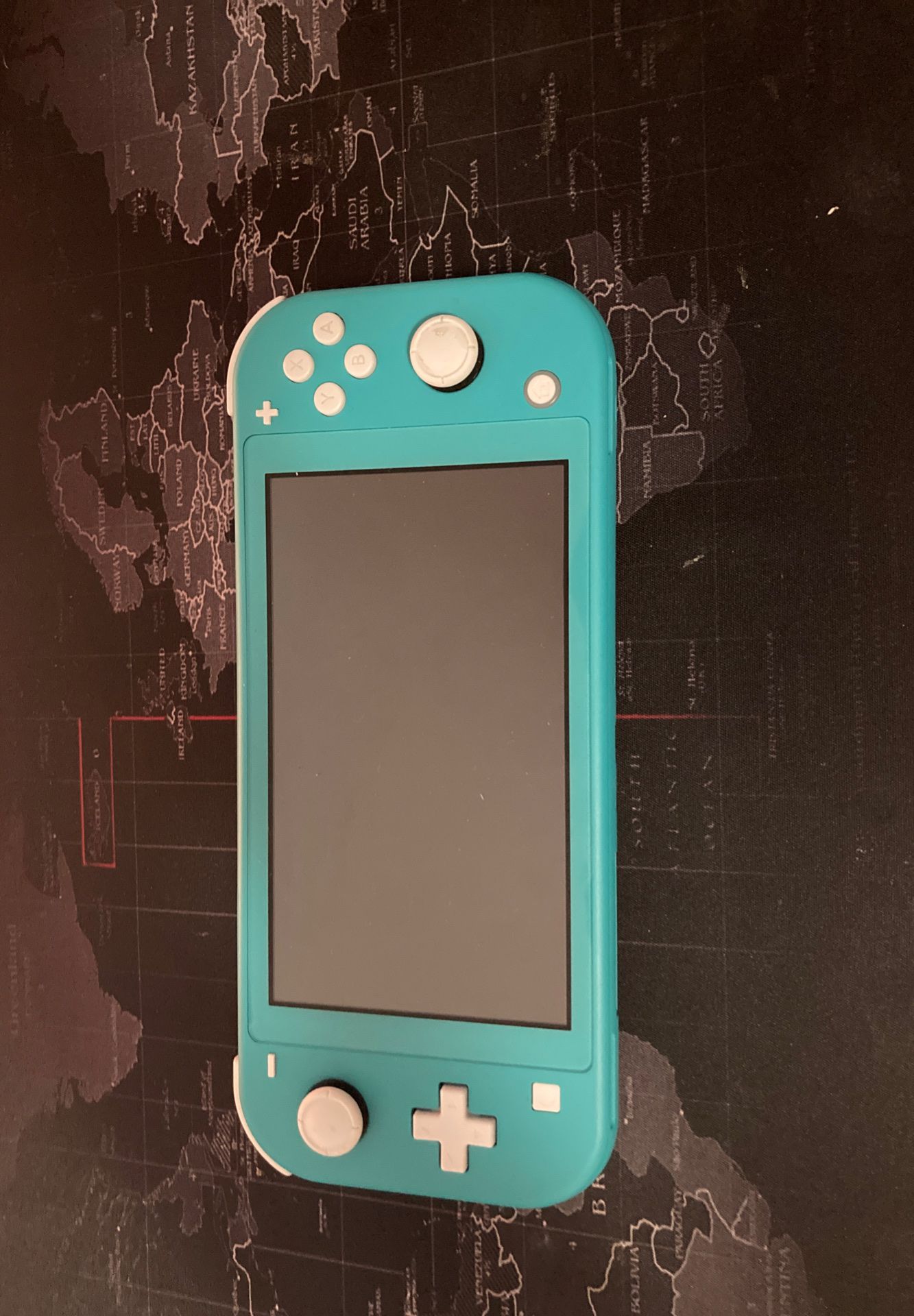 Nintendo switch lite (turquoise) barley used with carrying case and charger