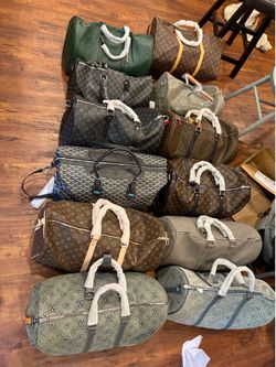 Duffle bags and purses for sale