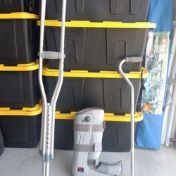Crutches, Orthopedic Boot And Cane.