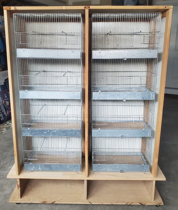 2 Four Stack Cages + Wooden Encasing On Caster Wheels 