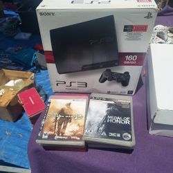 PLAYSTATION 3 W/GAMES 
