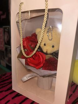 roses and a teddy bear (fake roses)