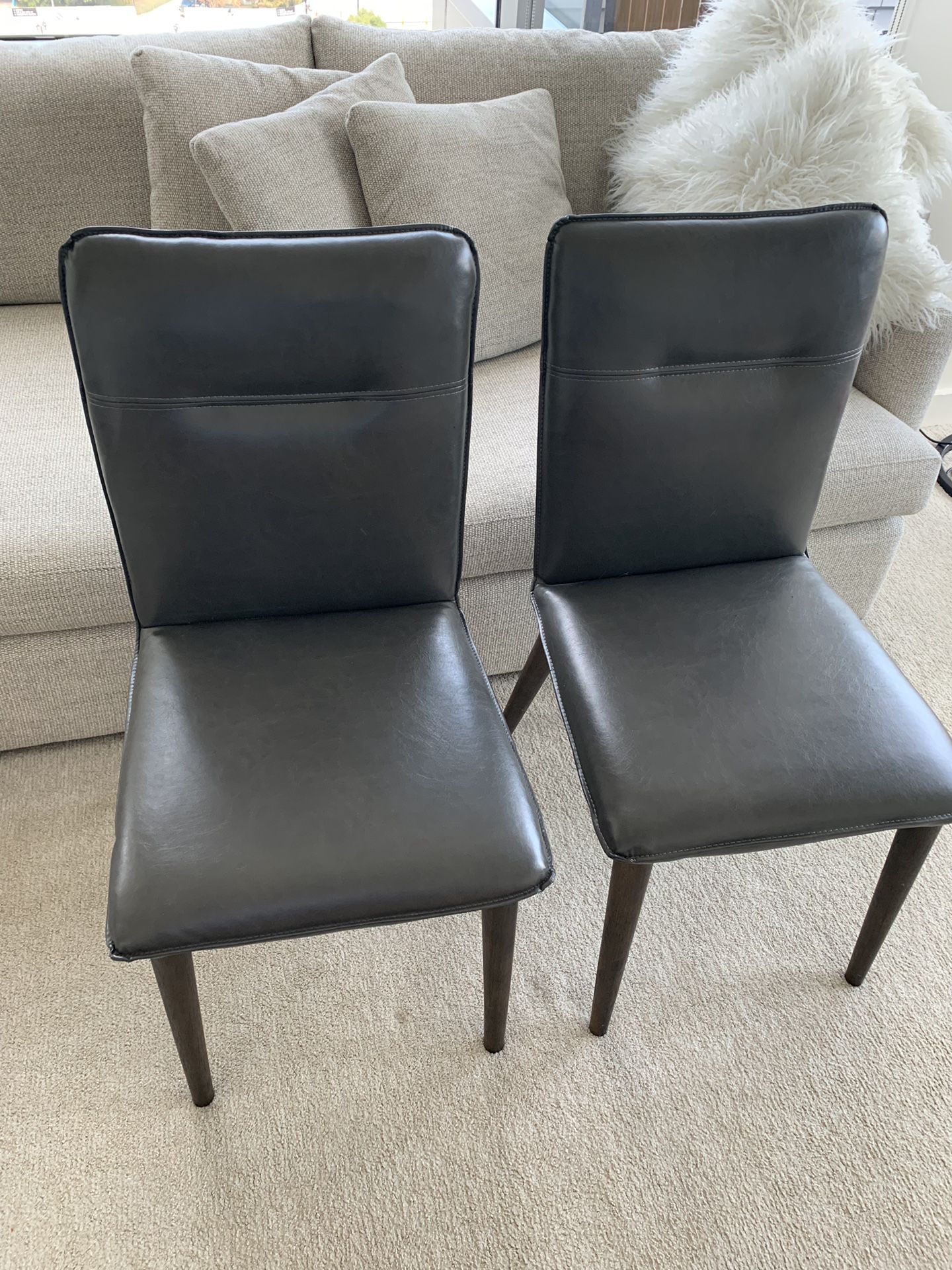 2 dining chairs CB2
