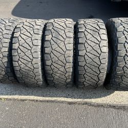 (5) 35x12.50R17 Nitto Ridge Grappler 