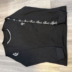 Black chrome long sleeve. Size: M
