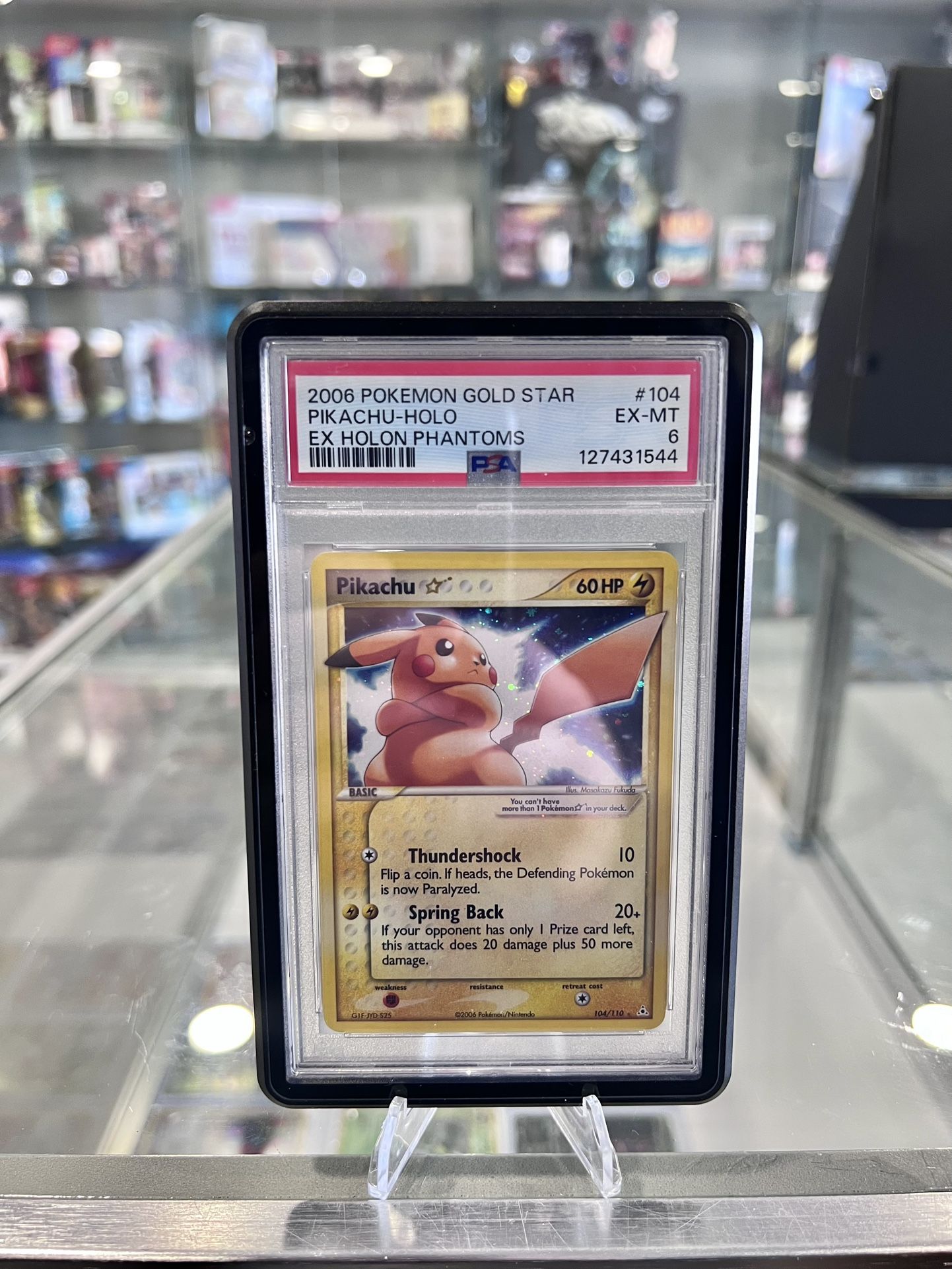 2006 Pokemon Gold Star Ex Holon Phantoms #104 Pikachu Holo PSA 6 with swirl