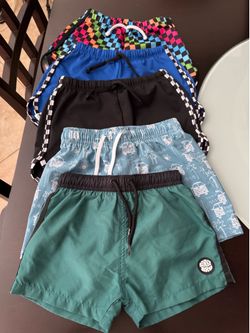 George hats/BinkyBro Swim (size 4-5y)